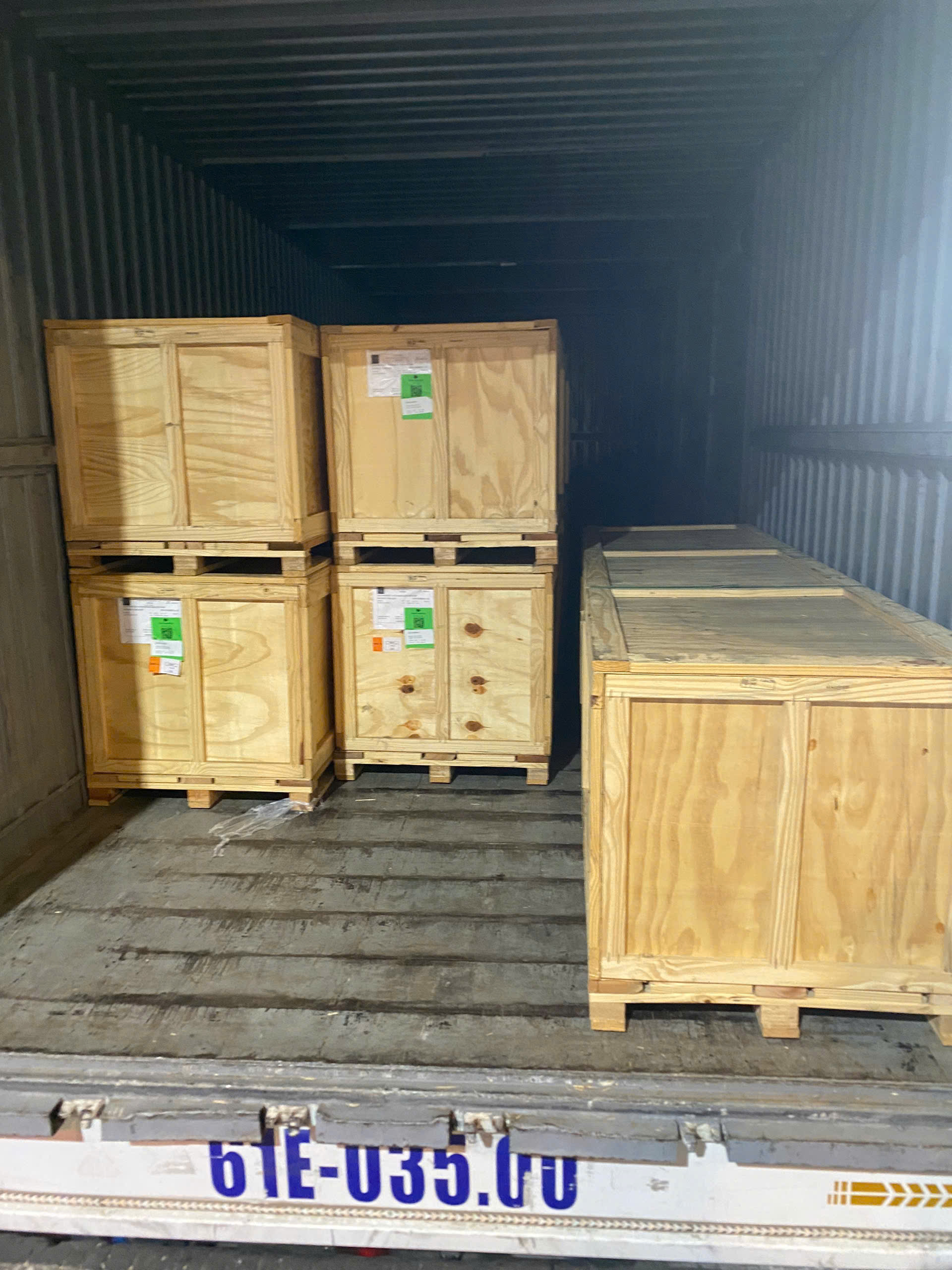 Wooden crates inside shipping container